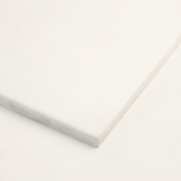 3x6 honed Thassos White marble tile, corner view highlights the crisp edges and ultra-white tone of this classic rectangular format.