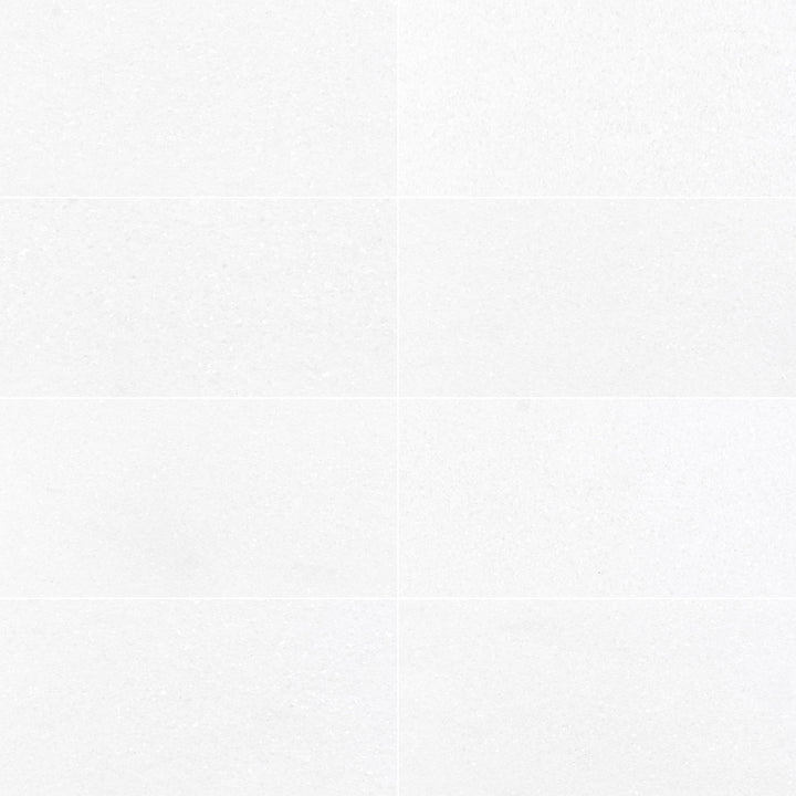 Thassos White Marble 6x12 Honed Tile offers a smooth matte finish and generous sizing for a subtle, refined look.