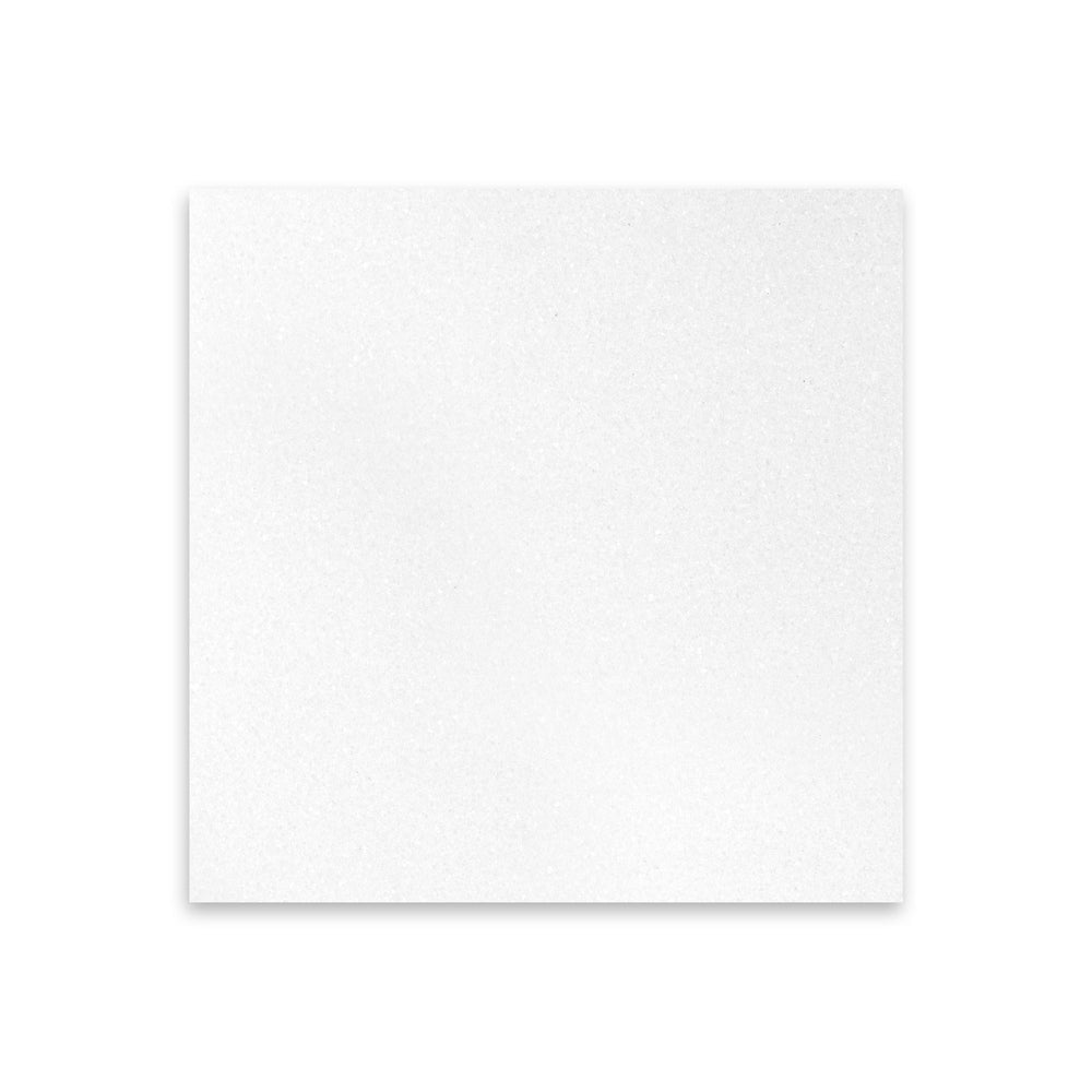 Honed Thassos White Marble 12x12 tile shown from above, offering balanced proportions and subtle matte surface for serene designs.