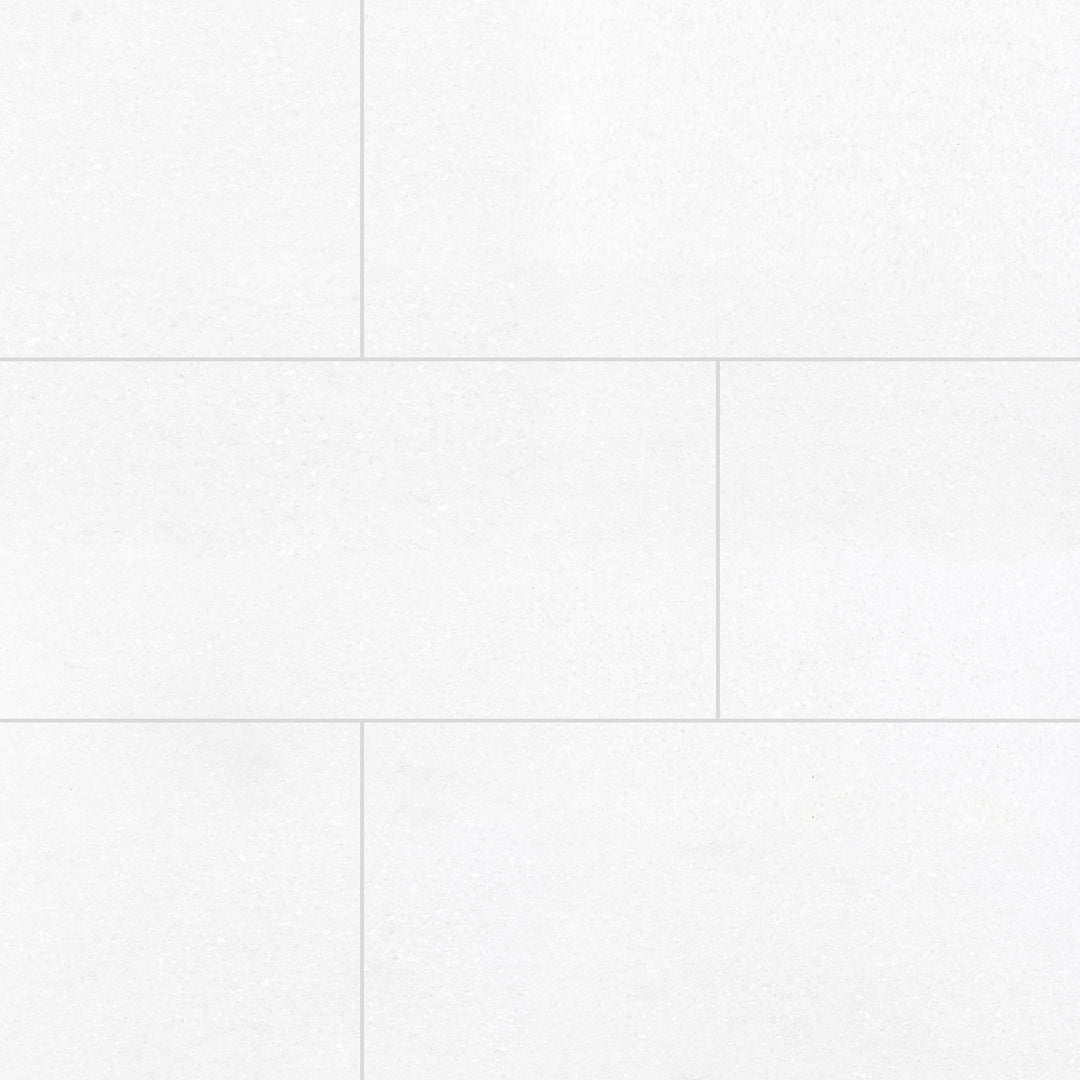 Thassos White Marble 12x24 Honed Tile features a matte finish and bright white tone in a sleek rectangular format ideal for modern designs.