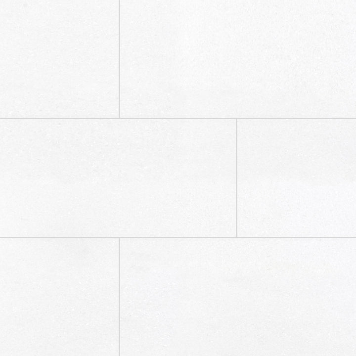 Thassos White Marble 12x24 Honed Tile features a matte finish and bright white tone in a sleek rectangular format ideal for modern designs.