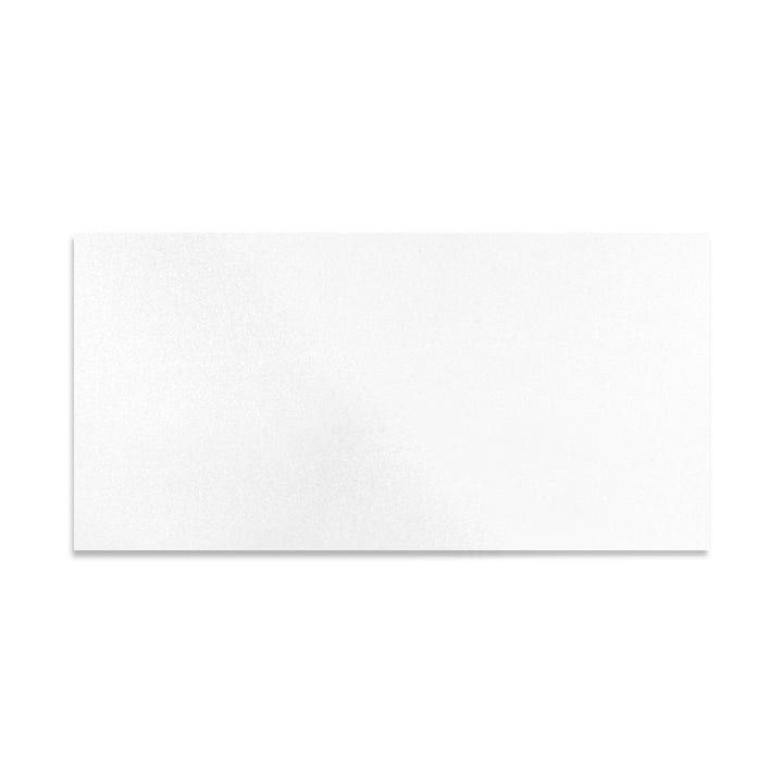 Overhead shot of Thassos White Marble 12x24 polished tile, providing elongated format and glossy brilliance for striking visual appeal.