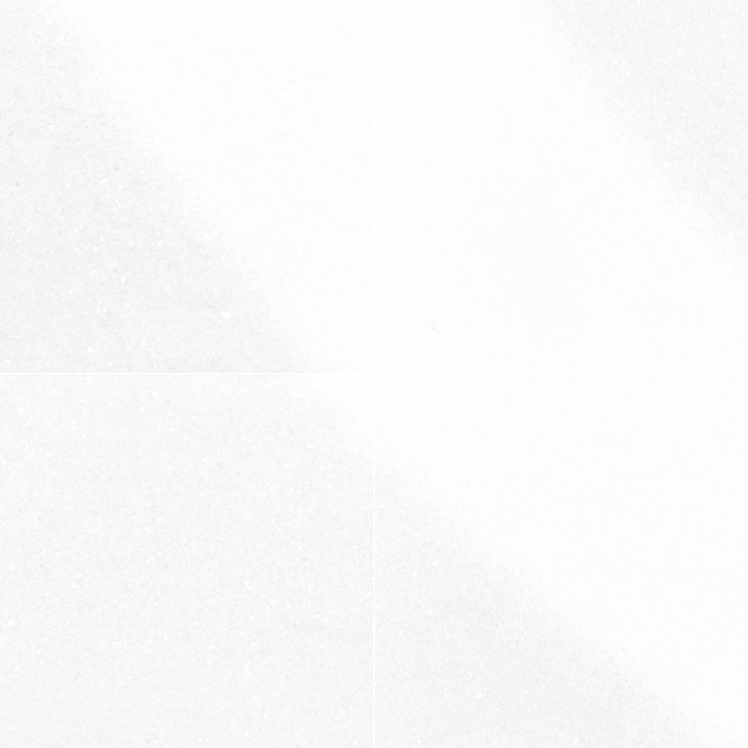 Elevating large spaces, the Thassos White Marble 24x24 Polished Tile provides a luminous finish and luxurious white appearance.