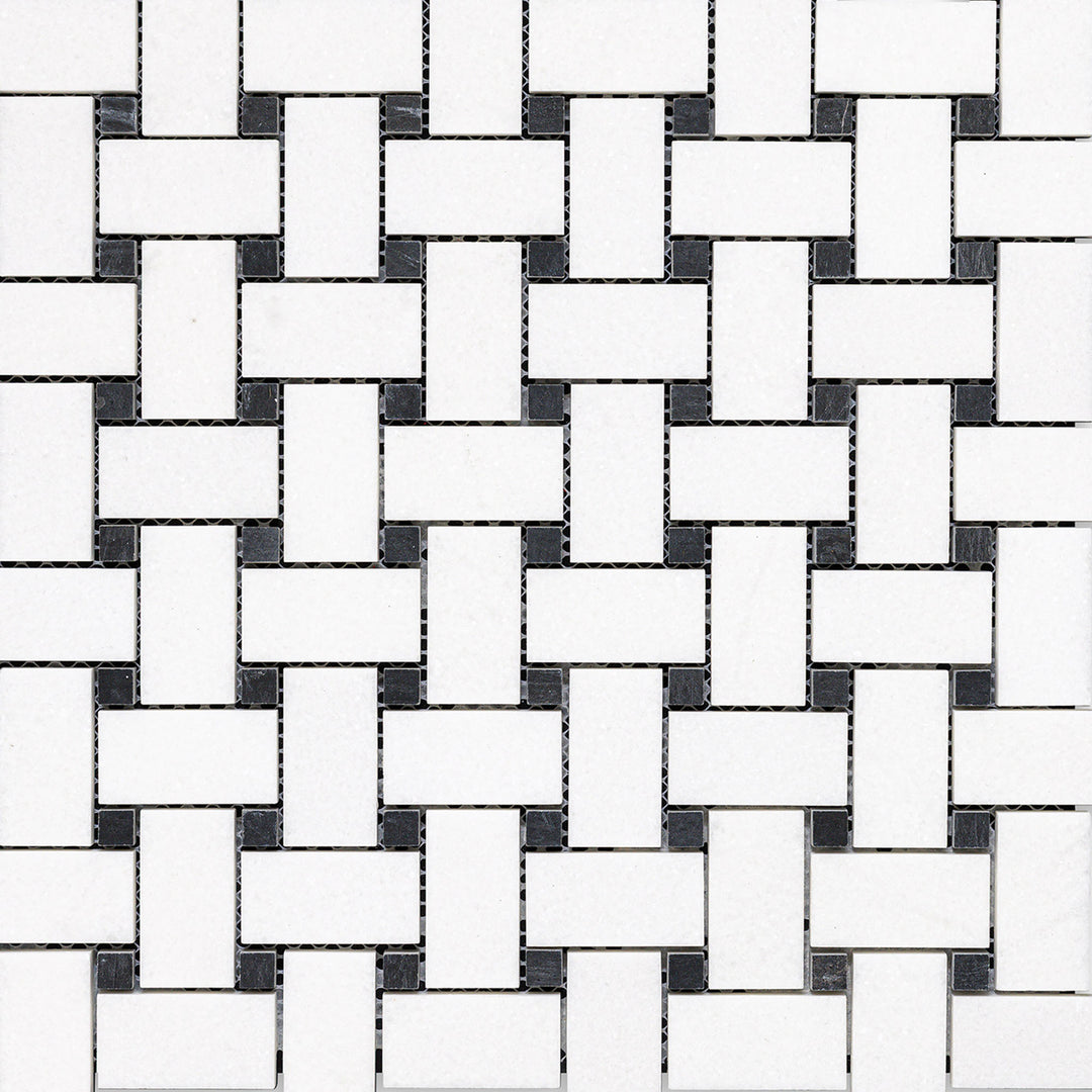 Classic meets contrast in the Thassos White Marble Basketweave with Black Dot Honed Mosaic, offering a timeless pattern in a matte finish.