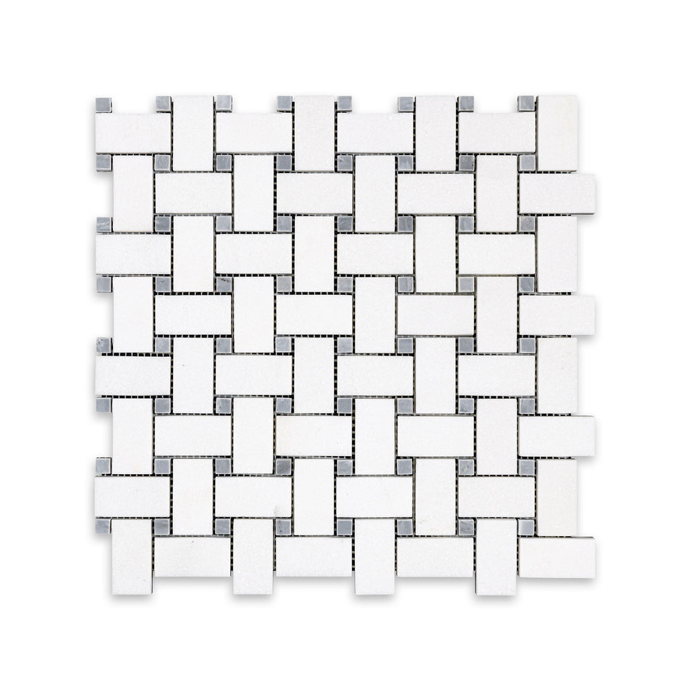 Overhead shot of Thassos White Marble basketweave mosaic with blue dot in honed finish, featuring soft matte surface and subtle color contrast.