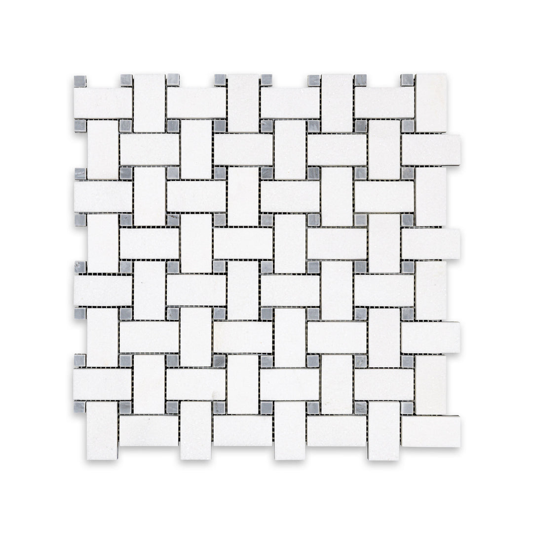 Overhead shot of Thassos White Marble basketweave mosaic with blue dot in honed finish, featuring soft matte surface and subtle color contrast.