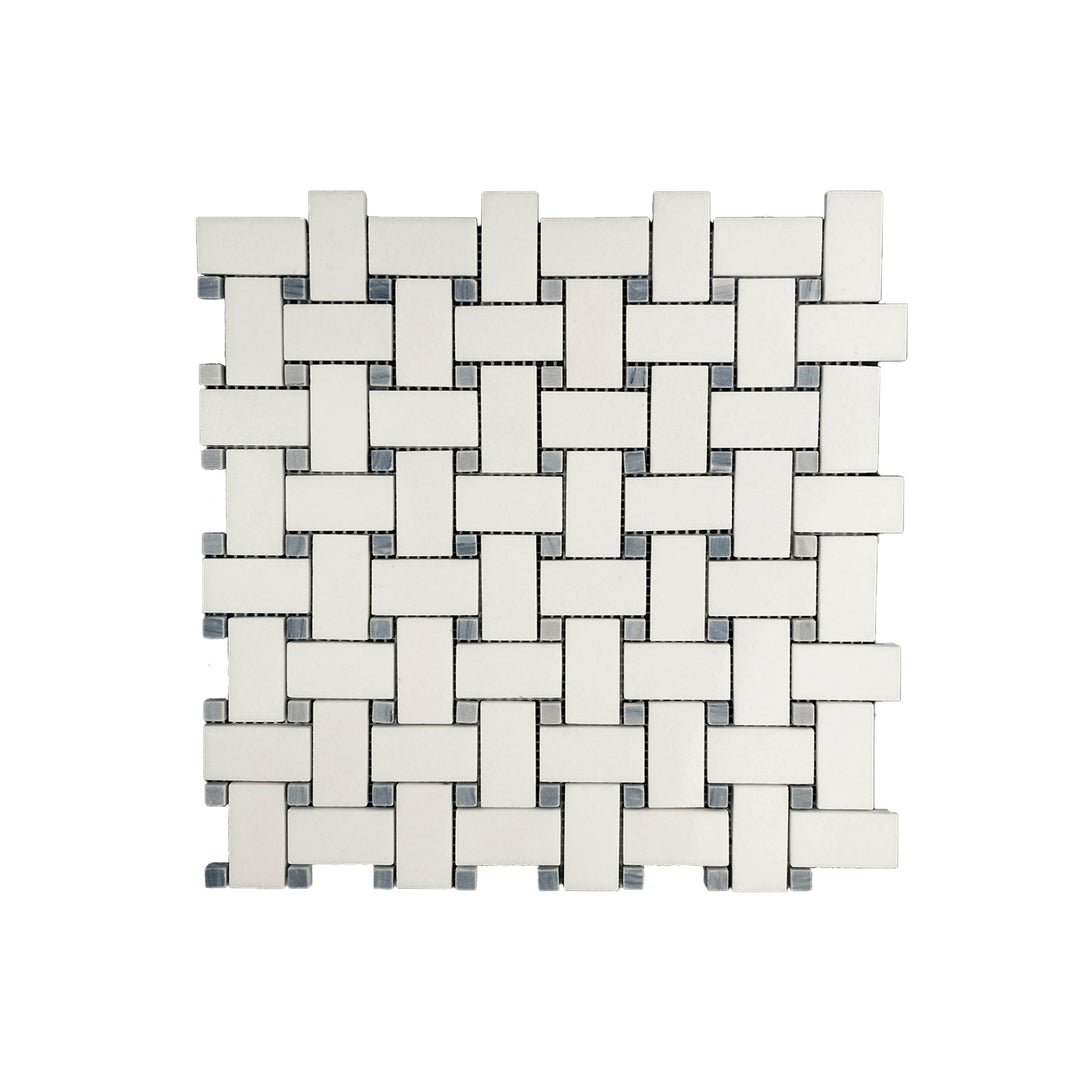 Polished Thassos White Marble basketweave mosaic with blue dot captured from the top, offering a clean bright layout with glossy accents and cool color tones.