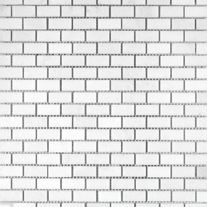 Overview of Thassos White Marble 5/8x1-1/4 Brick Honed Mosaic highlighting tight tile spacing and a honed finish.