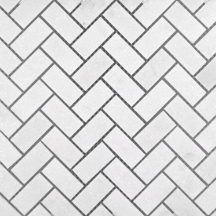Full view of Thassos White Marble 1x2 Herringbone Polished Mosaic showing crisp white marble in a polished herringbone layout.