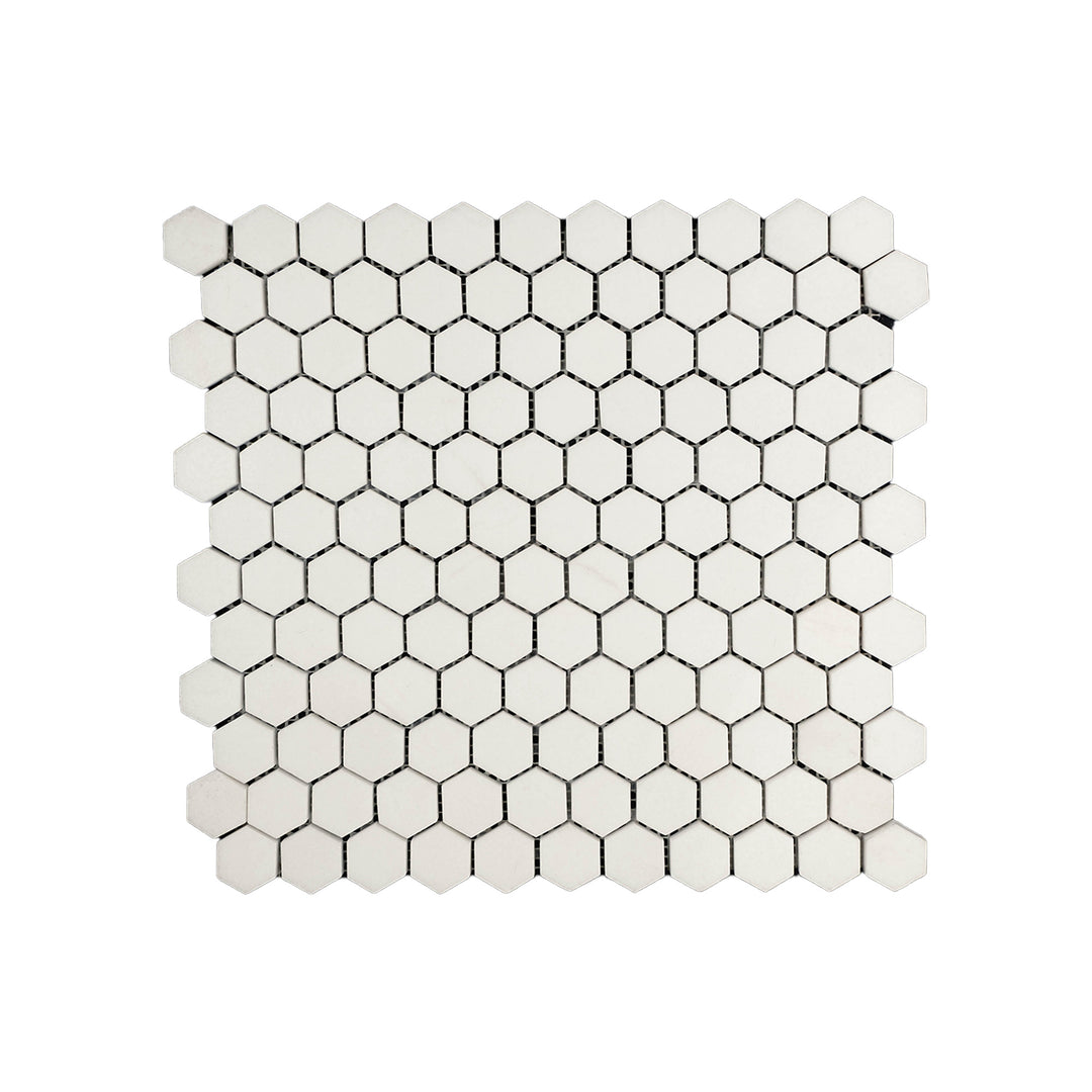 Polished Thassos White Marble 1 inch hexagon mosaic viewed from above, offering clean geometric form and radiant finish in a bright white palette.
