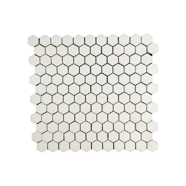 Polished Thassos White Marble 1 inch hexagon mosaic viewed from above, offering clean geometric form and radiant finish in a bright white palette.