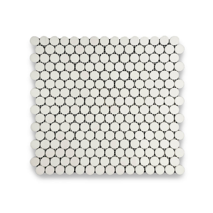 Polished Thassos White Marble penny round mosaic seen from the top, displaying crisp round tiles and glossy surfaces with elegant white brilliance.