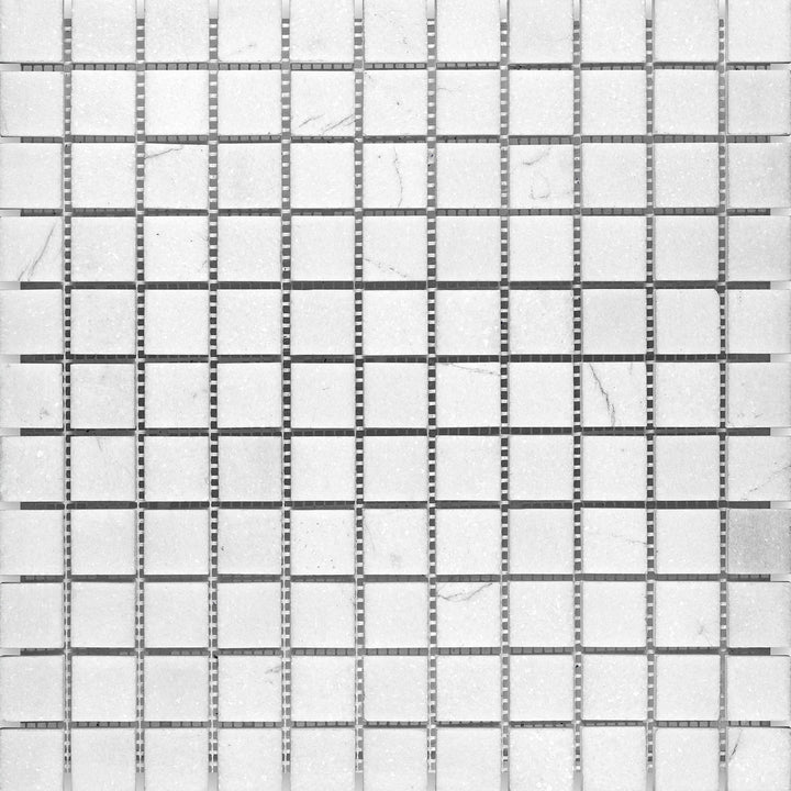Surface view of Thassos White Marble 1" Square Honed Mosaic featuring matte white tiles in a neat, uniform square pattern.