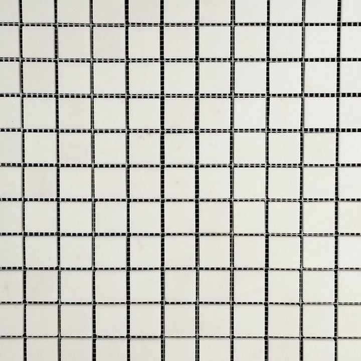 Clean view of Thassos White Marble 1" Square Polished Mosaic highlighting glossy square marble tiles arranged in a grid layout.