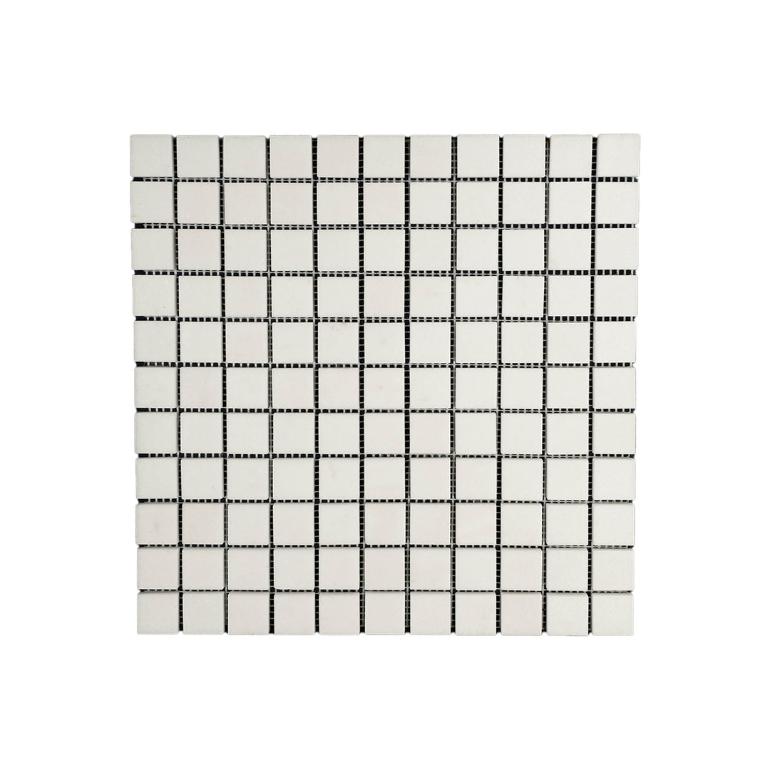 Top-down view of Thassos White Marble 1 inch square mosaic in polished finish, combining classic layout with reflective white marble sheen.