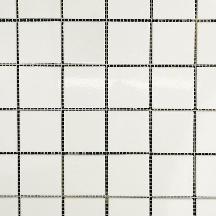 Full view of Thassos White Marble 2" Square Polished Mosaic displaying bright white polished marble tiles in a clean square layout.