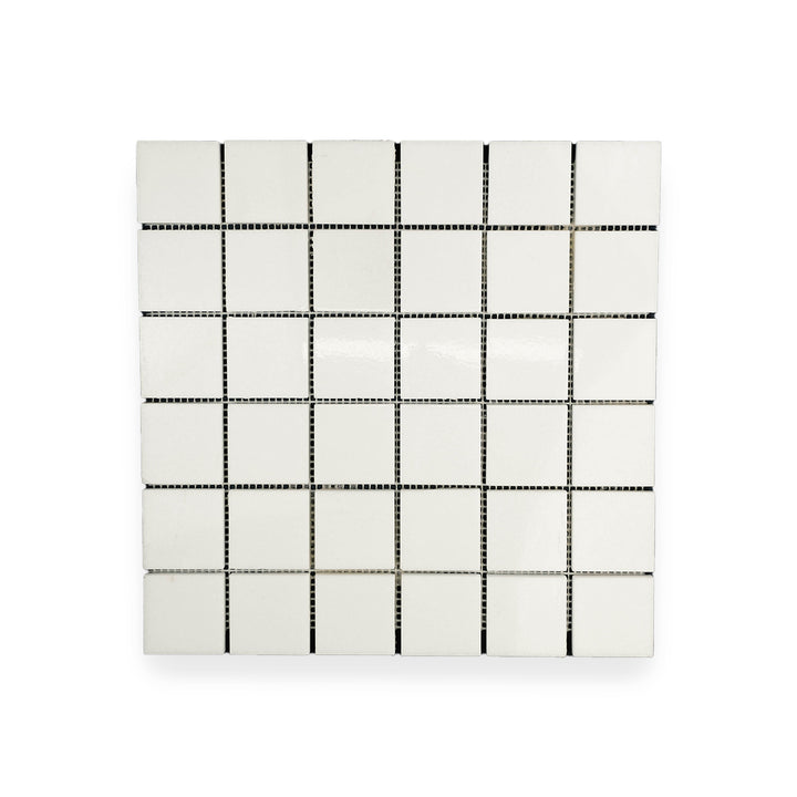 Polished Thassos White Marble 2 inch square mosaic seen from above, combining uniform white color and glossy surface for a refined look.