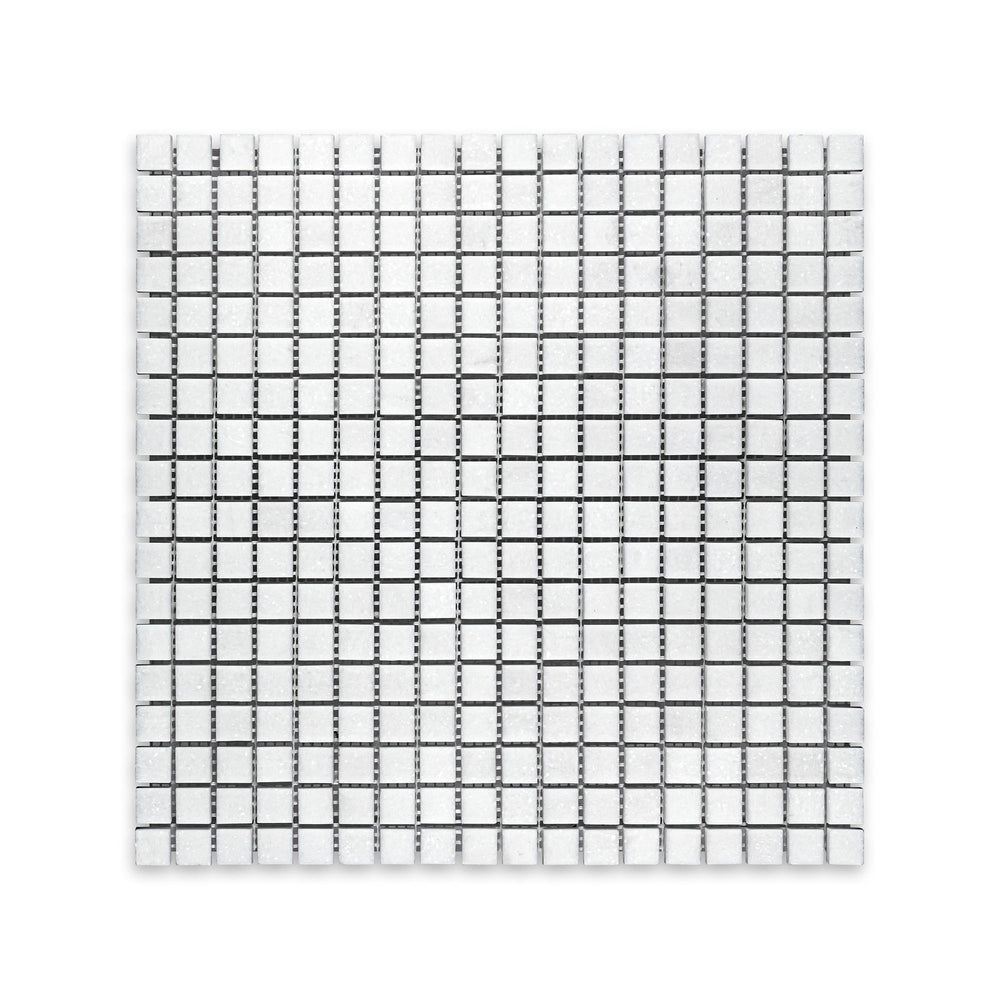 Overhead image of Thassos White Marble 5/8 inch square mosaic in honed finish, offering tightly spaced grid layout with soft white texture.