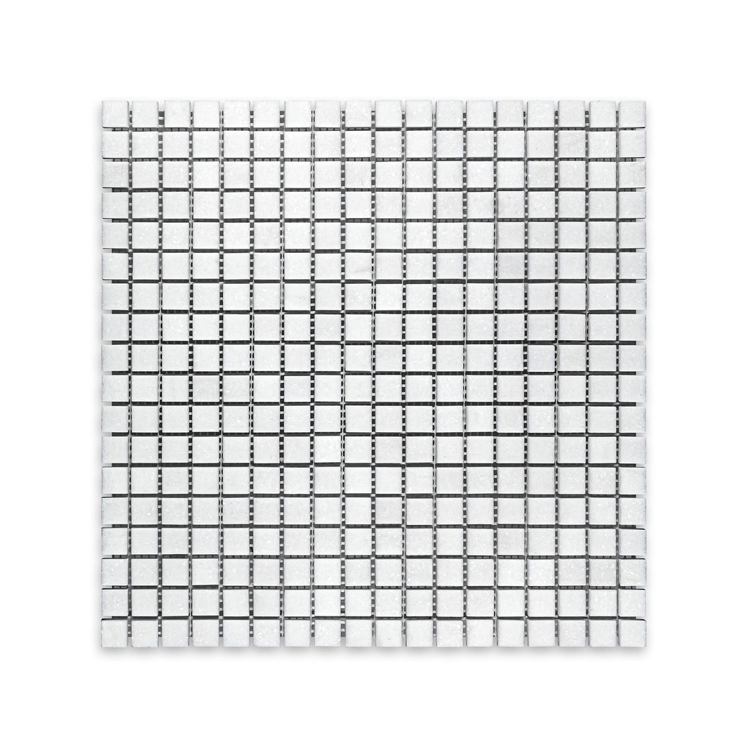 Overhead image of Thassos White Marble 5/8 inch square mosaic in honed finish, offering tightly spaced grid layout with soft white texture.
