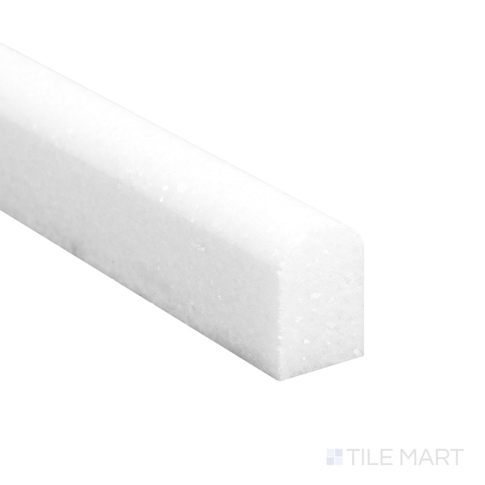 From a detailed edge view, the Thassos White Marble 0.5x12 honed mini liner shows a silky matte texture and crisp profile.