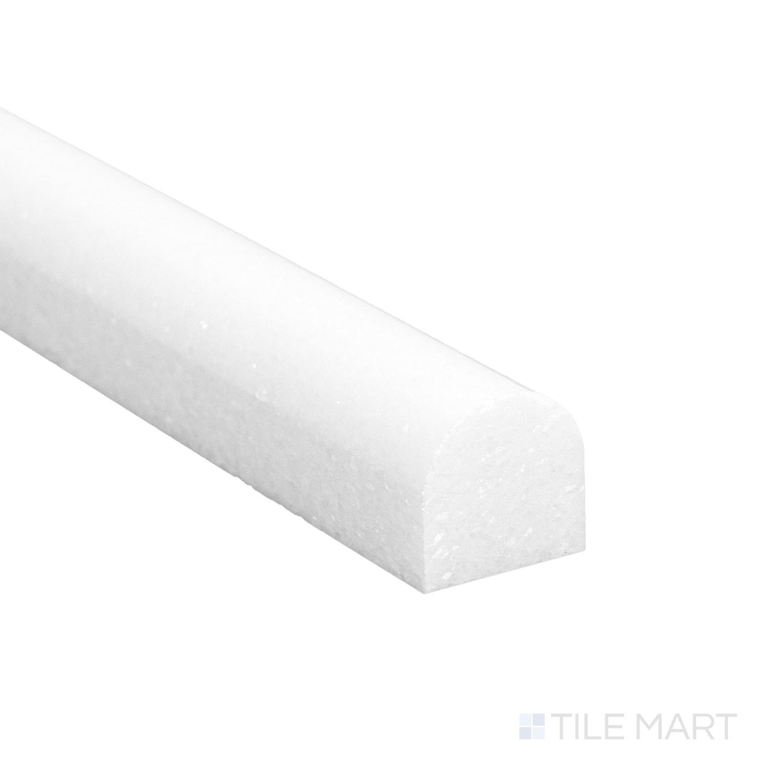 A close corner shot of Thassos White Marble 0.75x12 polished standard liner revealing a bright surface and clean edge.