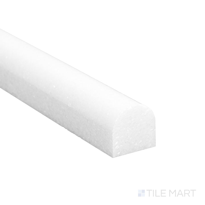 A close corner shot of Thassos White Marble 0.75x12 polished standard liner revealing a bright surface and clean edge.