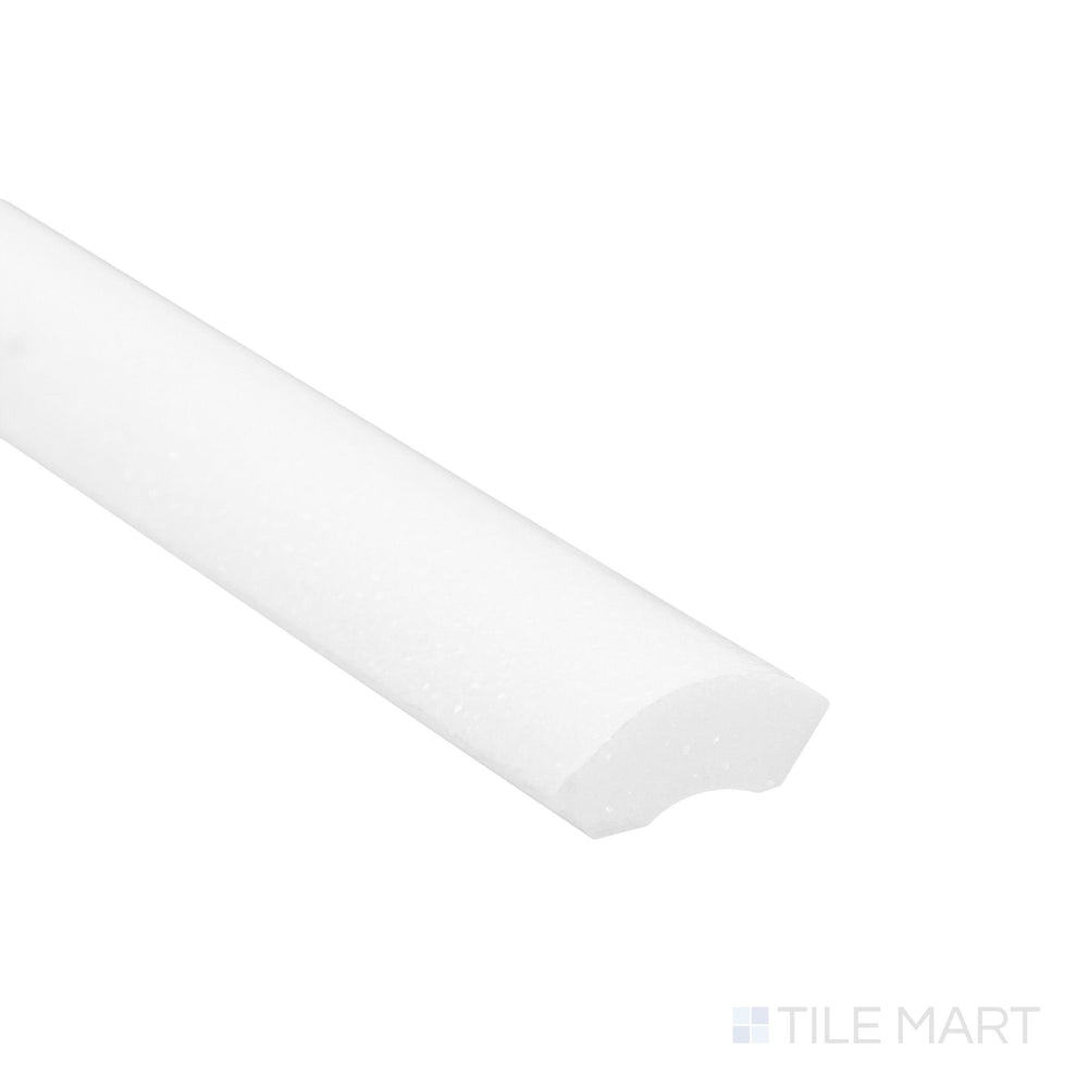 A close corner view of Thassos White Marble 1x12 honed quarter round showing smooth matte curve and crisp white tone.