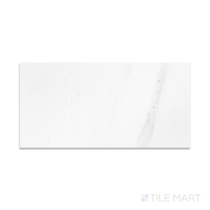 Flat-lay of Thassos White Marble 12x24 polished tile, a large format white marble slab with a reflective polished finish.