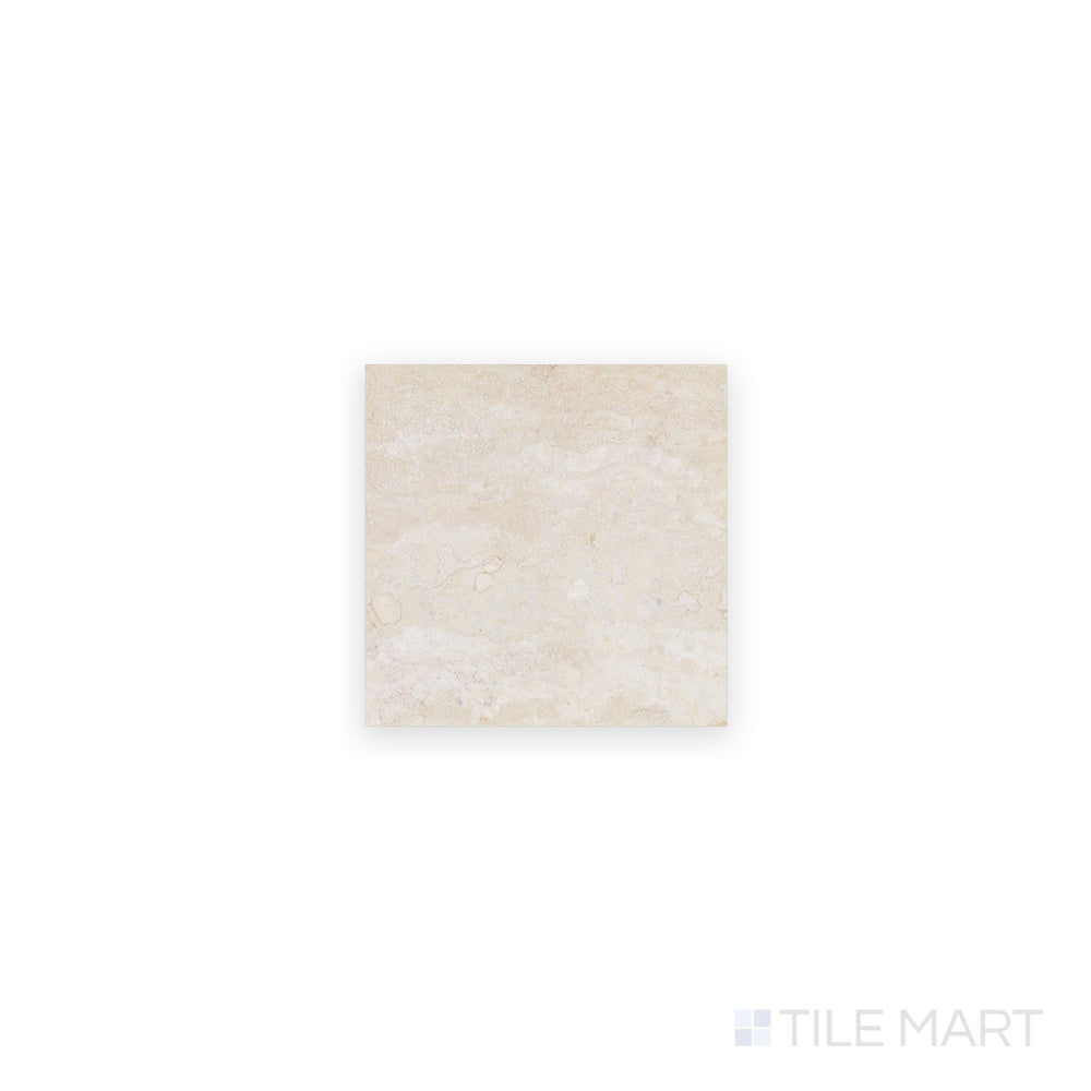 Ivory Premium Travertine 4x4 filled and honed tile viewed from above, showcasing a smooth matte surface with warm neutral color and refined texture.