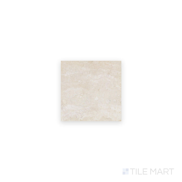 Ivory Premium Travertine 4x4 filled and honed tile viewed from above, showcasing a smooth matte surface with warm neutral color and refined texture.