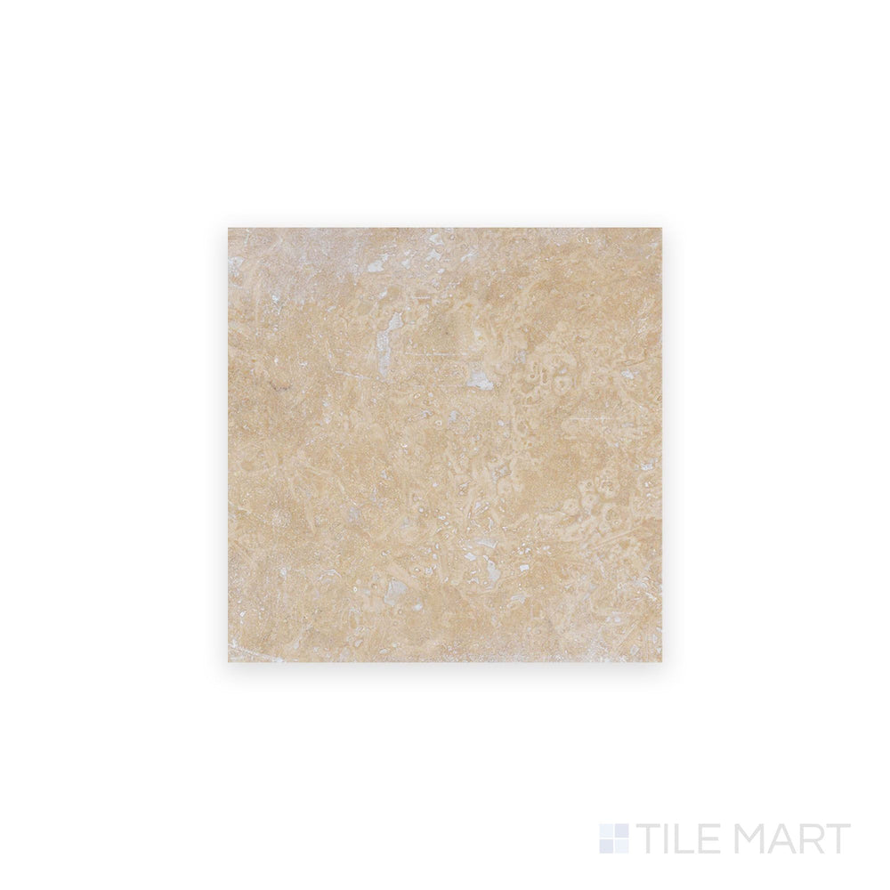 Top-down view of Ivory Premium Travertine 6x6 filled and honed tile, showcasing its warm beige tones and soft, filled texture.