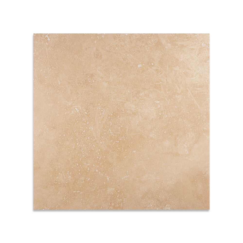 Ivory Premium Travertine 24x24 tile in filled and honed finish seen from above, offering a smooth, elegant surface with neutral tones and subtle movement.