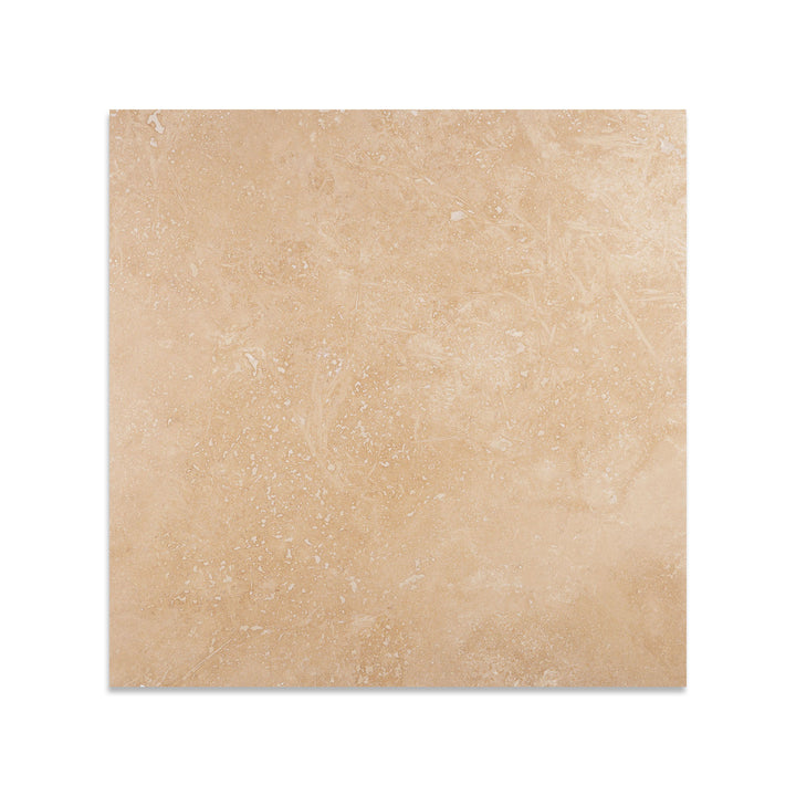 Ivory Premium Travertine 24x24 tile in filled and honed finish seen from above, offering a smooth, elegant surface with neutral tones and subtle movement.