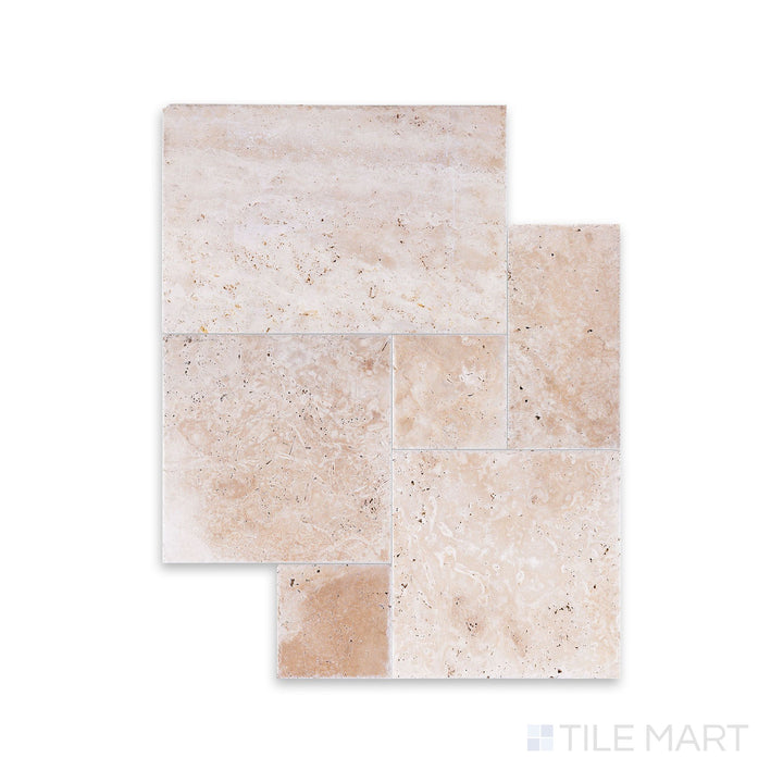 Top-down shot of Ivory Premium Travertine Versailles pattern in brushed and chiseled finish, highlighting varied tile sizes and textured antique edges.