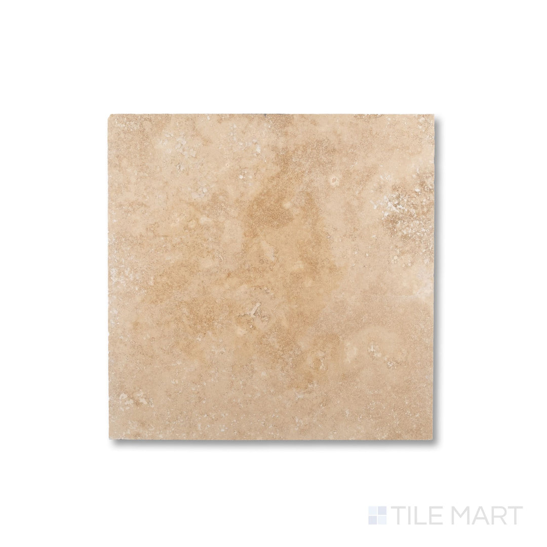 Top-down shot of Vera Cruz Travertine 18x18 tile in filled and honed finish, combining balanced dimensions and creamy beige coloration for timeless appeal.