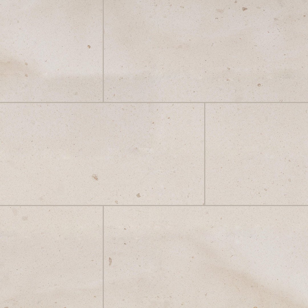 Full view of Crema Europa Limestone 12x24 Honed Tile featuring neutral beige tones in a sleek, rectangular format with a smooth finish.