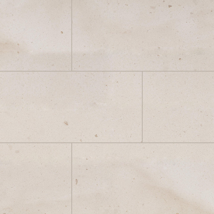 Full view of Crema Europa Limestone 12x24 Honed Tile featuring neutral beige tones in a sleek, rectangular format with a smooth finish.