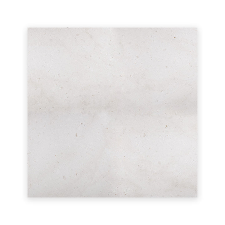 Overhead shot of Crema Europa Limestone 24x24 tile in honed finish, offering a spacious layout and subtle variation for elegant floor designs.
