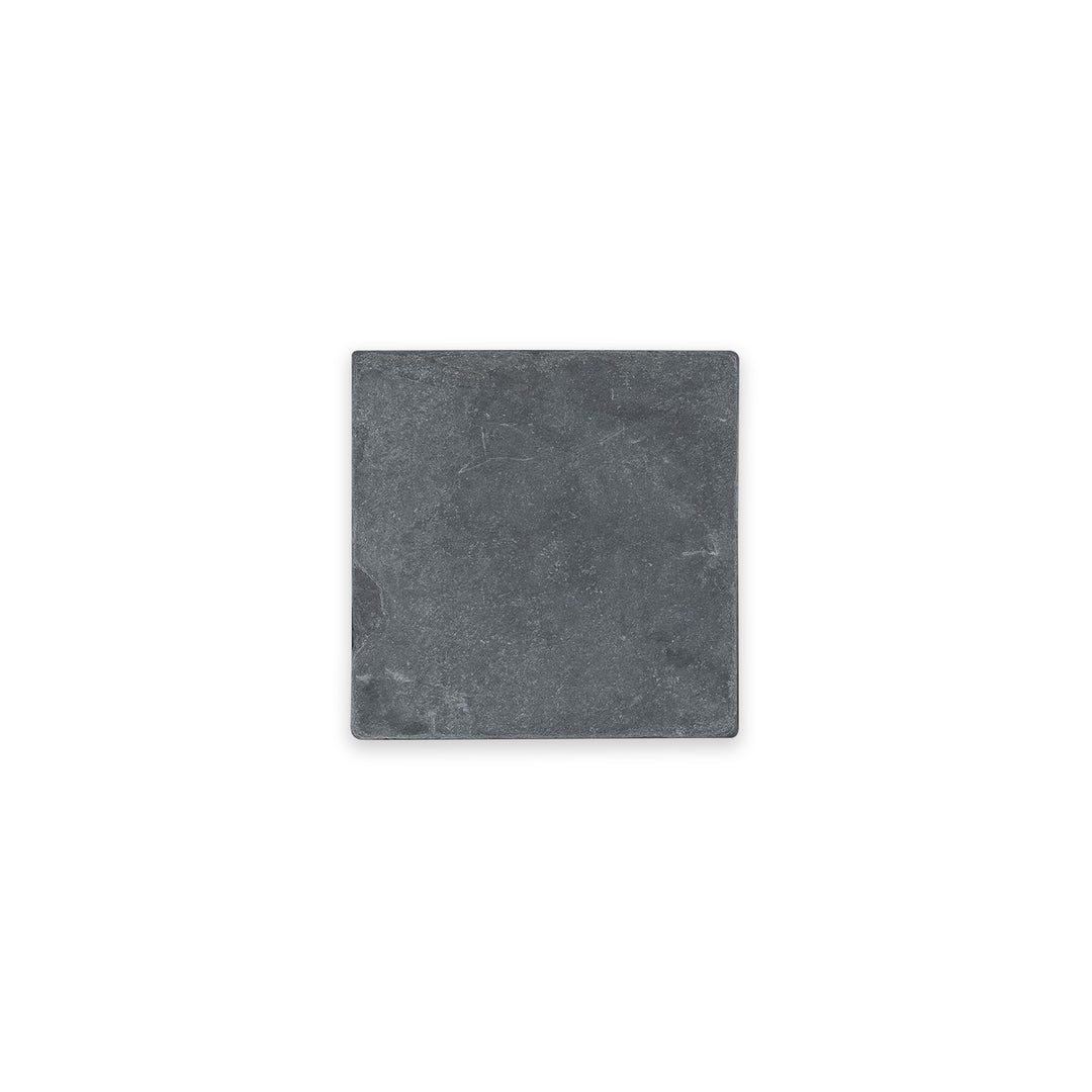 Overhead view of Indian Black Slate 4x4 tumbled tile, showcasing a compact layout with textured surface and classic black stone character.