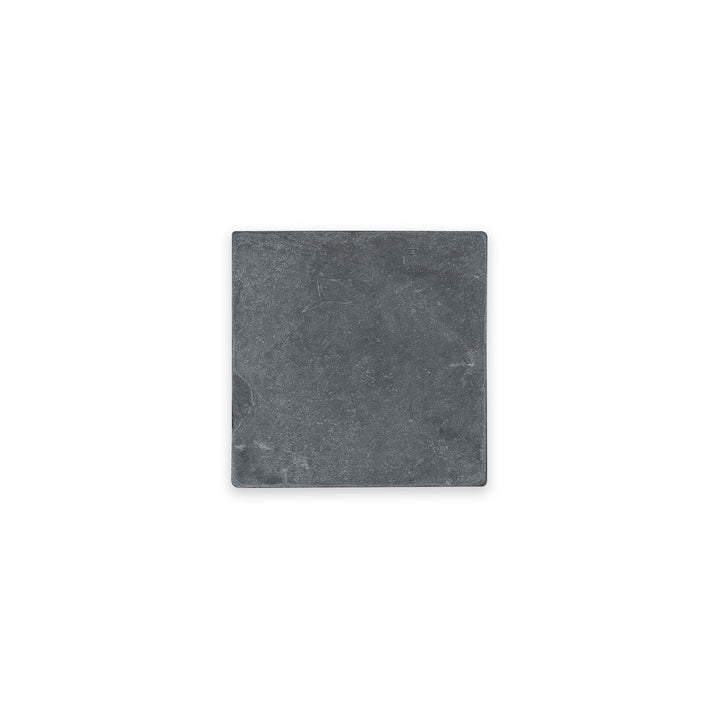 Overhead view of Indian Black Slate 4x4 tumbled tile, showcasing a compact layout with textured surface and classic black stone character.