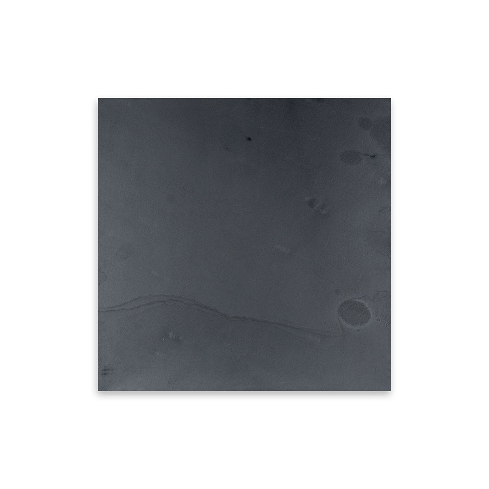 Indian Black Slate 12x12 tile in gauged finish seen from above, delivering a flatter, even surface with bold black tone and organic stone appeal.