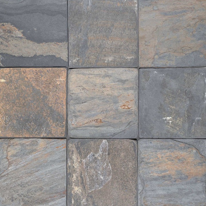 Clean view of California Gold Slate 6x6 Tumbled Tile showcasing varied coloration and a rough, aged texture for natural appeal.