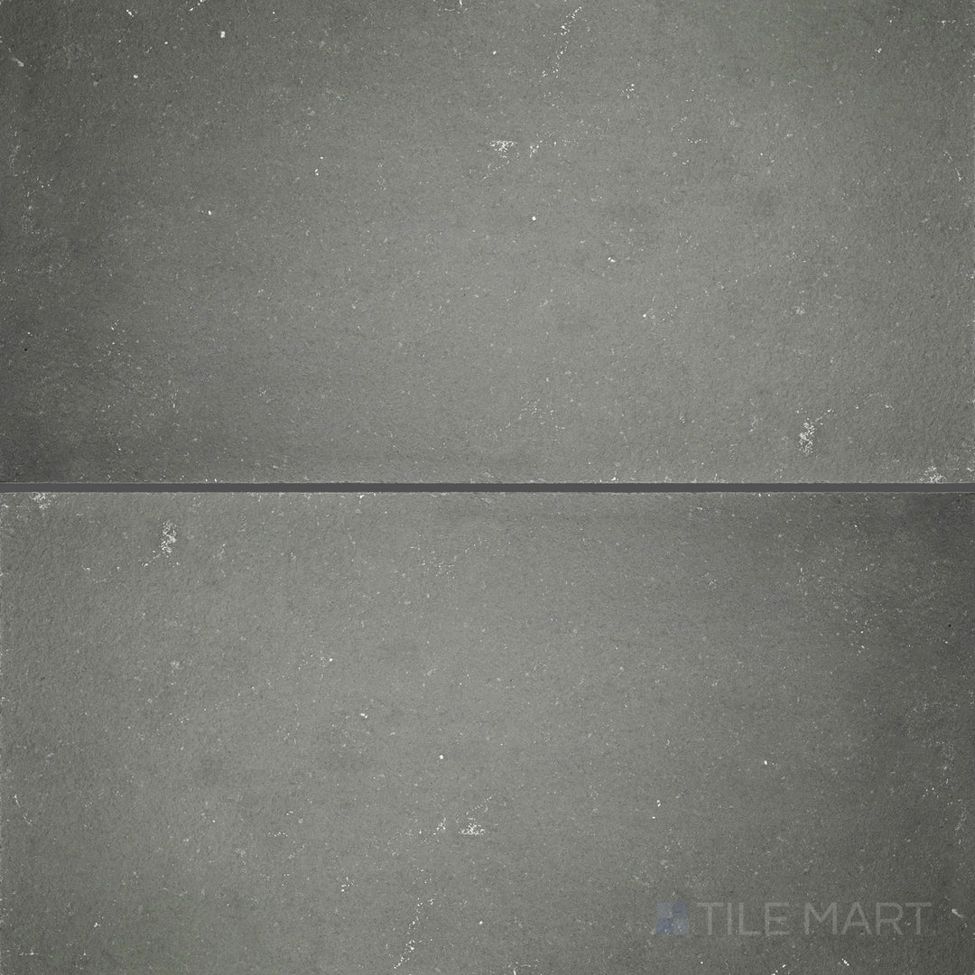 Overview of Indian Bluestone Slate 12x24 Gauged Tile featuring a deep blue-grey tone with a naturally varied matte finish in a linear format.