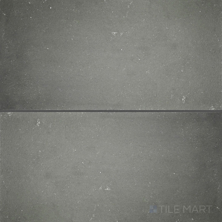 Overview of Indian Bluestone Slate 12x24 Gauged Tile featuring a deep blue-grey tone with a naturally varied matte finish in a linear format.