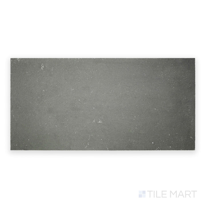 Top-down view of Indian Bluestone Slate 12x24 tile in gauged finish, featuring deep bluish-gray tones and a flat surface with natural stone character.