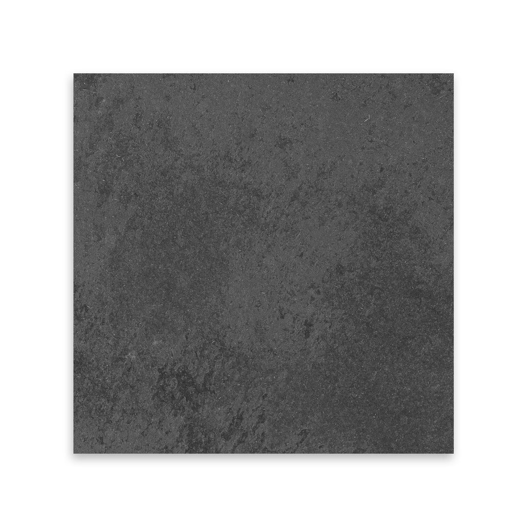 Brazilian Black Slate 12x12 tile in gauged finish seen from above, showcasing bold black coloration with a clean flat texture for modern applications.