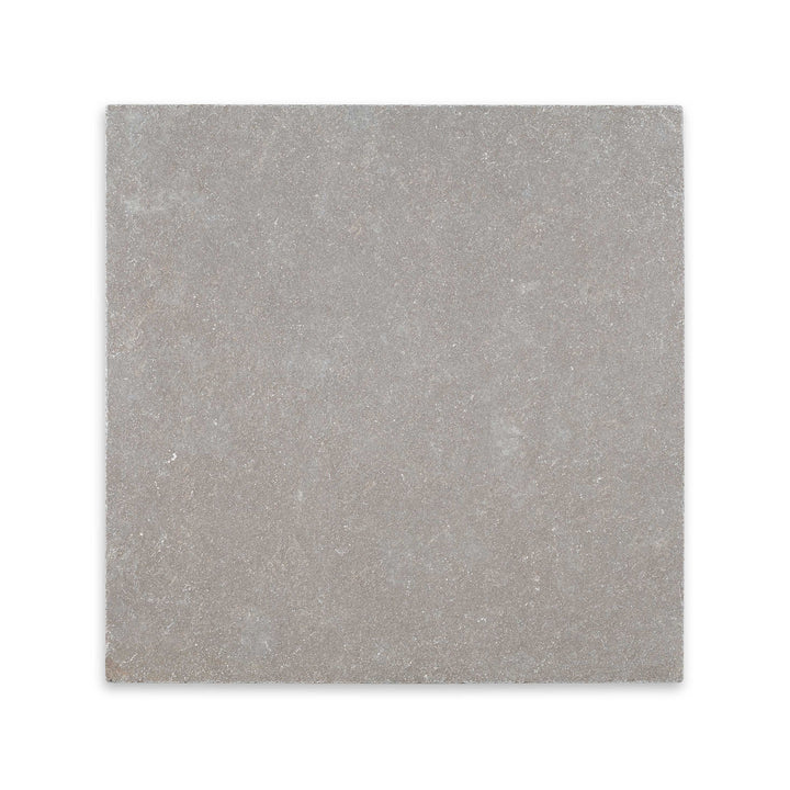 Overhead view of Limestone Purbeck Grey 24x24 distressed paver, featuring square format with a rugged texture and rustic, earthy appeal.