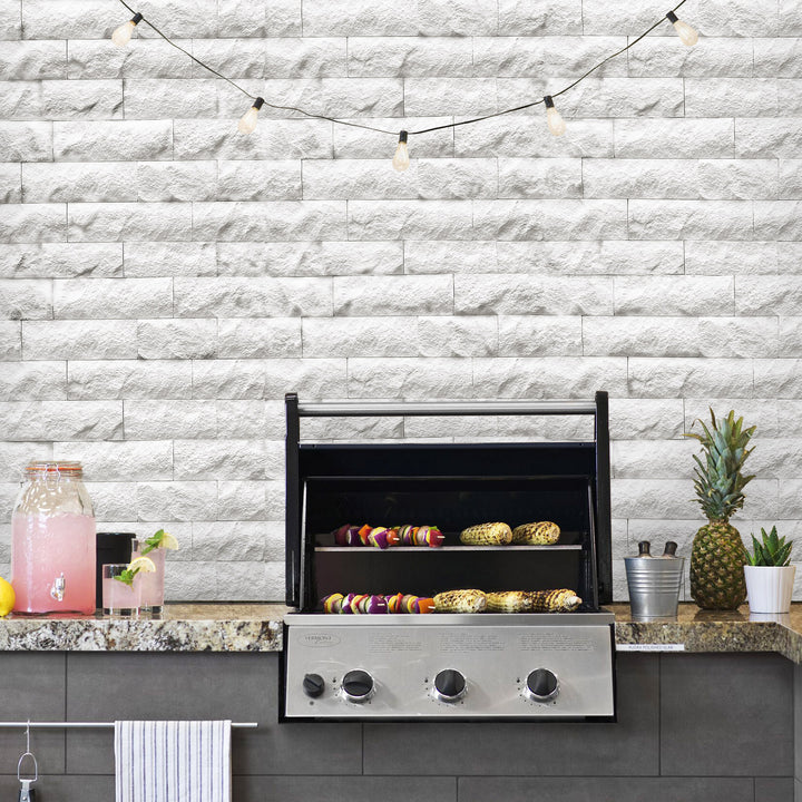 Lymra limestone veneer in random splitface pattern showcased in an elevated interior with natural stone depth