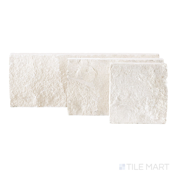 Top-down view of Lymra limestone veneer in 8x random splitface pattern showing layered stone texture