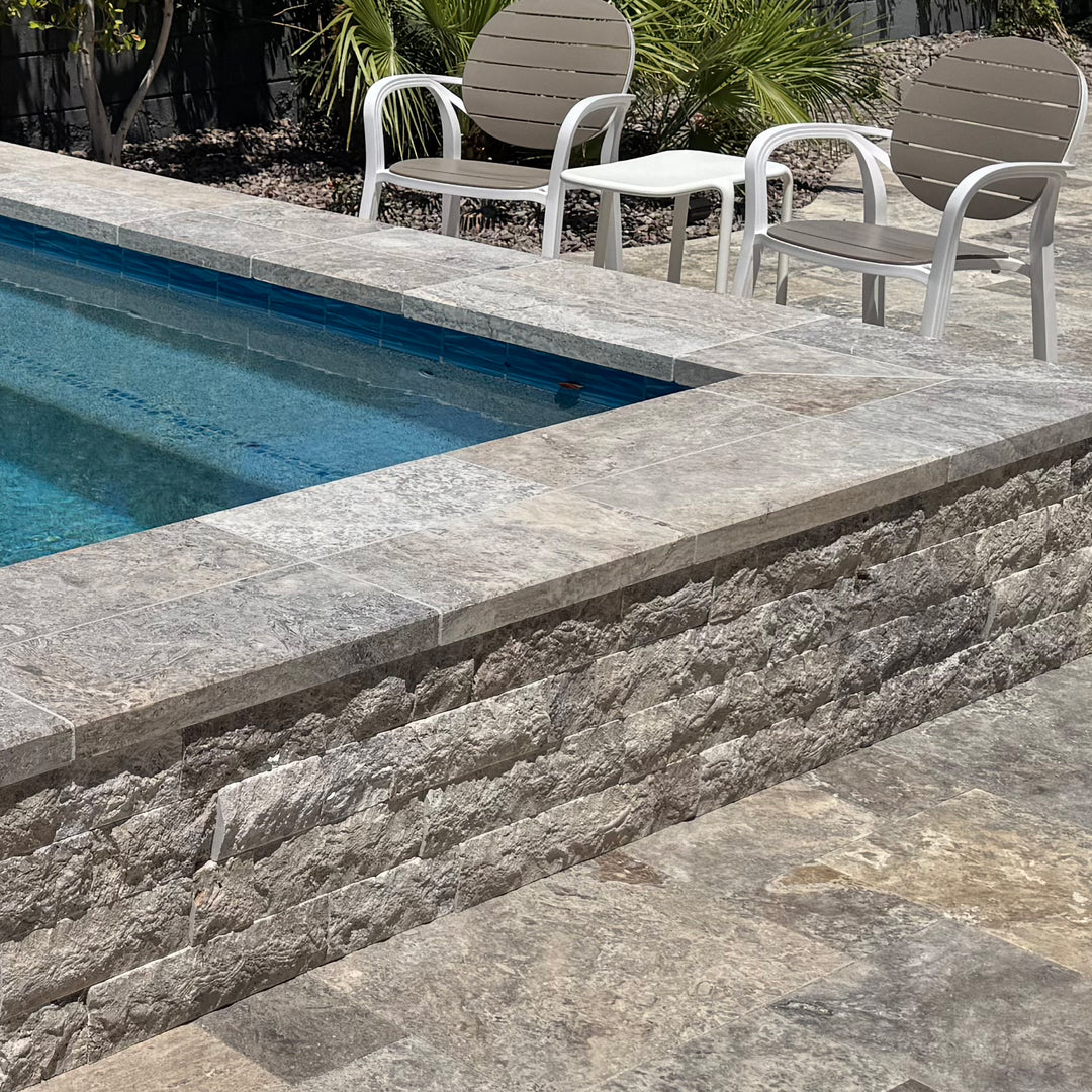 Silver travertine 4x7.5 corner veneer showcased in a contemporary setting with dimensional stone character